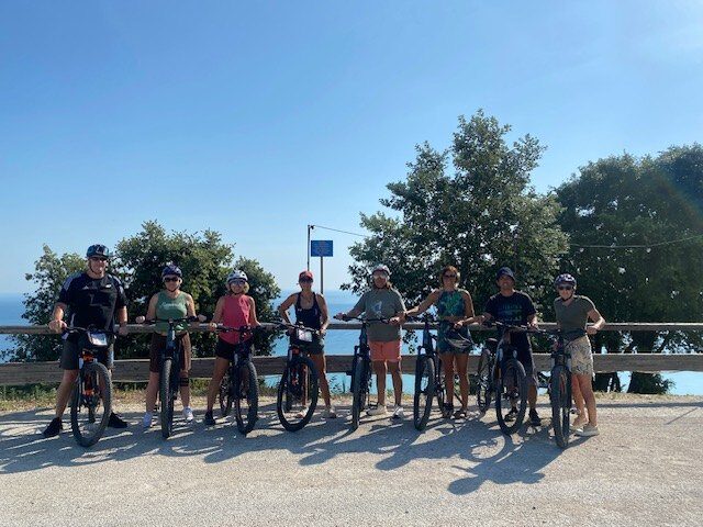 The group on e-bikes on the Maremma coast